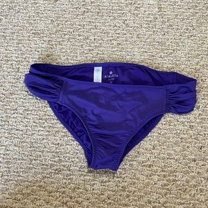Purple Athleta bathing suit bottoms
